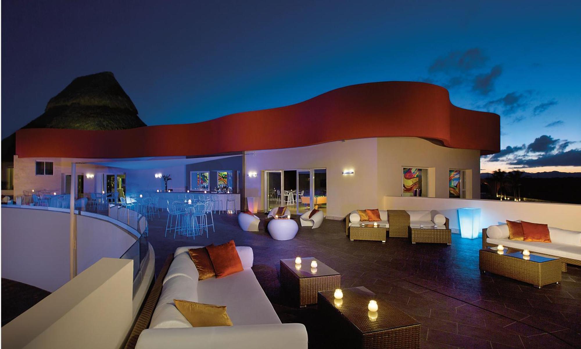 Breathless Punta Cana Resort & Spa (Adults Only) Esterno foto Rooftop bar at the Hard Rock Hotel